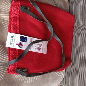 Red wool reversalable 9 by 11". Made in steamboat springs CO like new